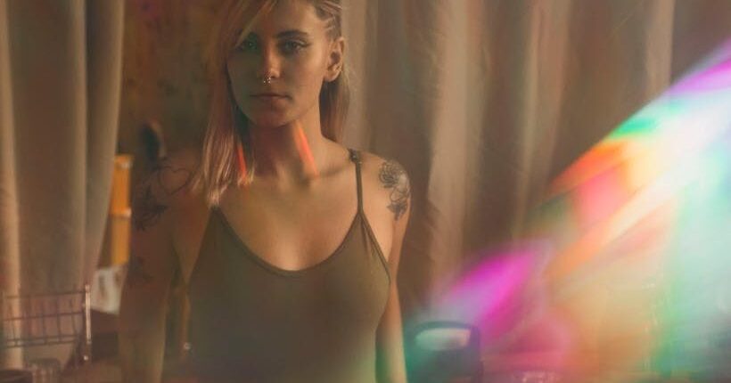 woman in spaghetti strap top