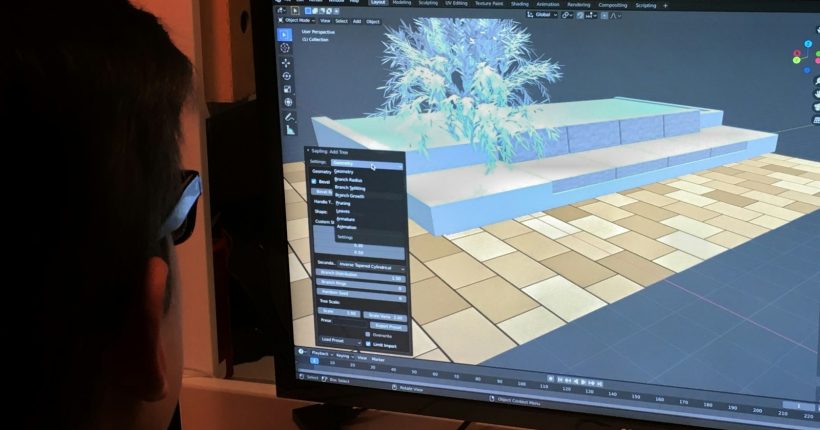 a person is looking at a computer screen