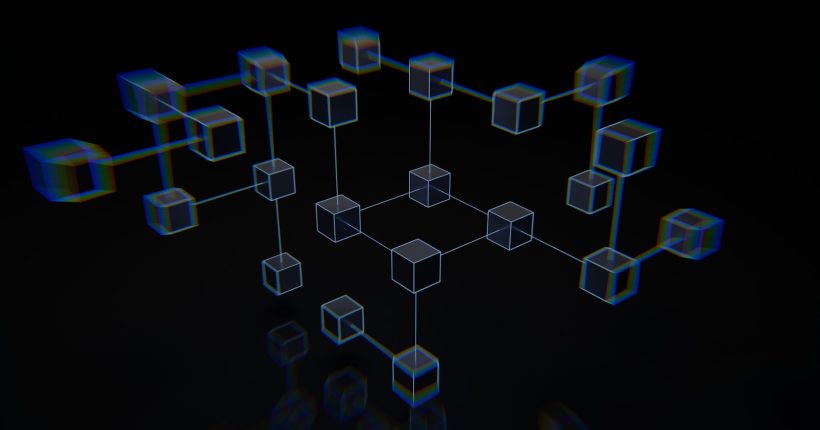 a group of cubes that are on a black surface