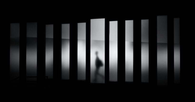 grayscale photo of person running in panel paintings