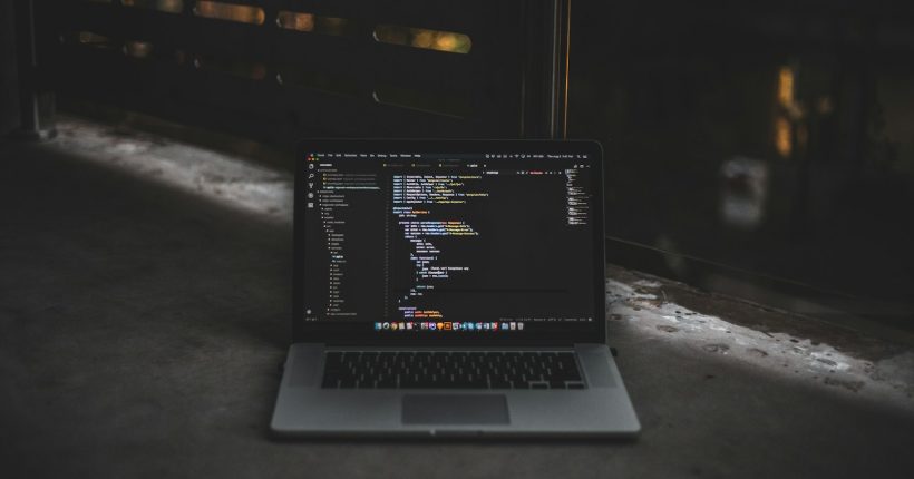 MacBook Pro inside gray room