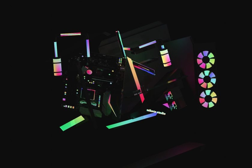 a black background with neon colored shapes