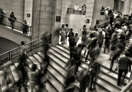 group of people walking on the stairs
