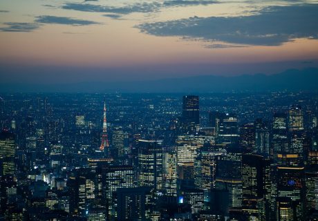 a view of a city at night from the top of a building
