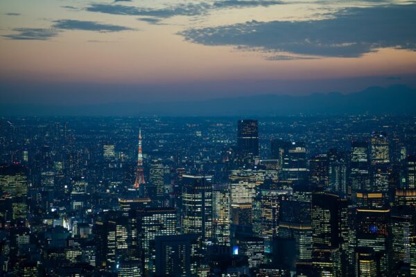 a view of a city at night from the top of a building