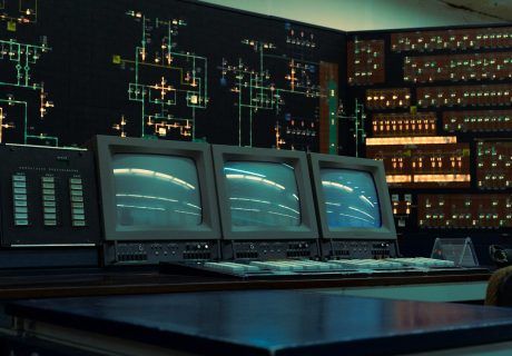 Inside an old-fashioned control room.