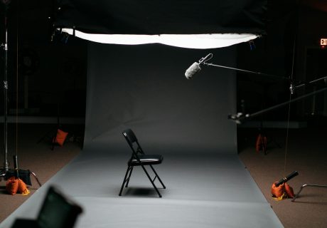 black folding chair on canvas