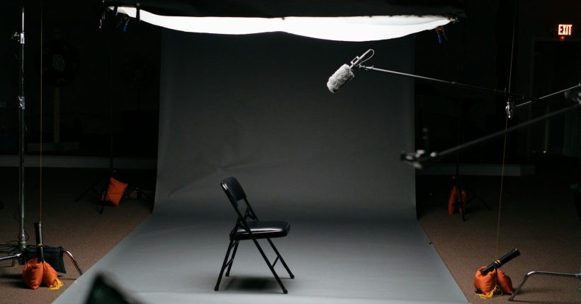 black folding chair on canvas