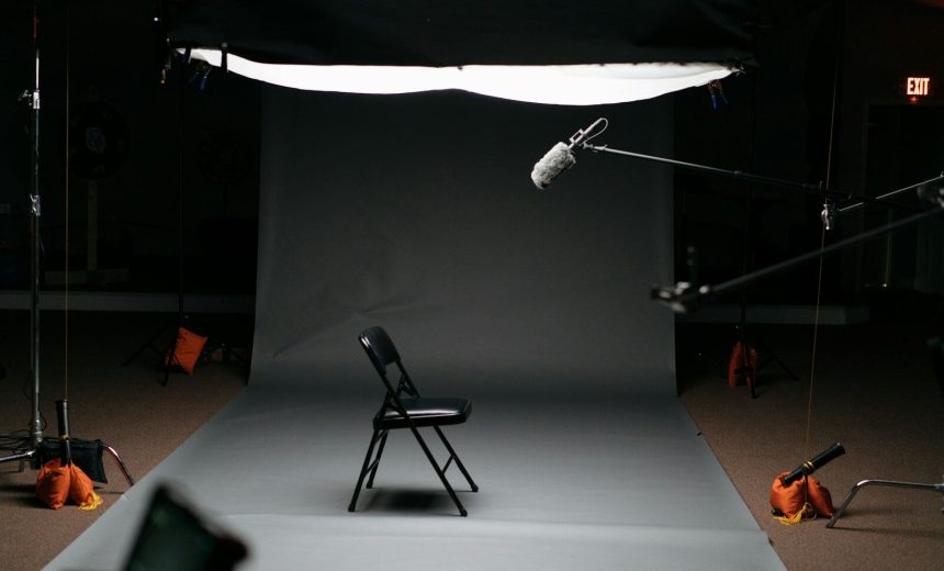 black folding chair on canvas