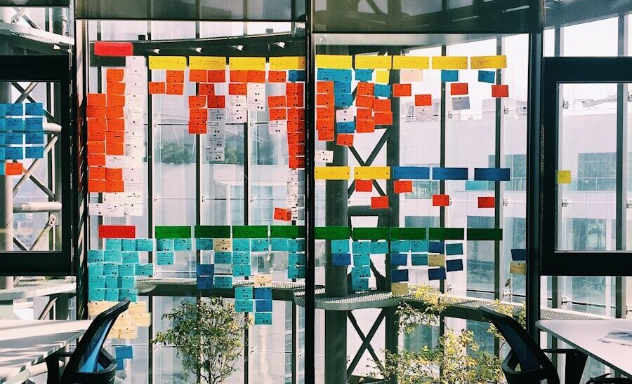 black rolling armchair under white table