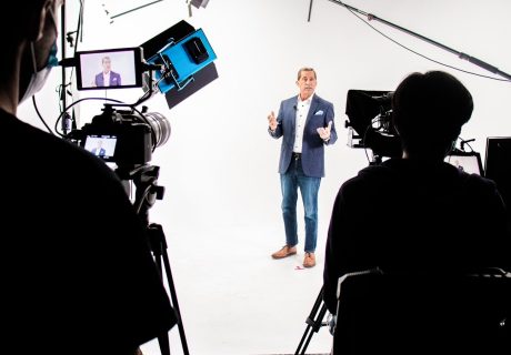 a man standing in front of a camera