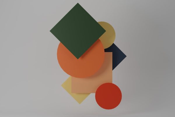 A modern composition of overlapping geometric shapes in vibrant colors forming an abstract design.