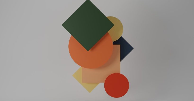 A modern composition of overlapping geometric shapes in vibrant colors forming an abstract design.