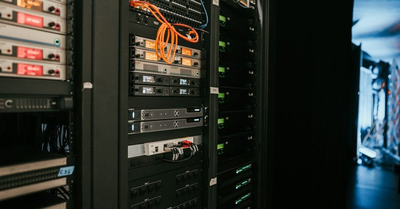 a rack of servers in a server room