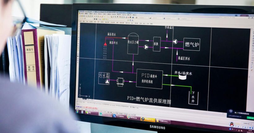 Crop unrecognizable programmer in eyeglasses using computer while working on project in modern office