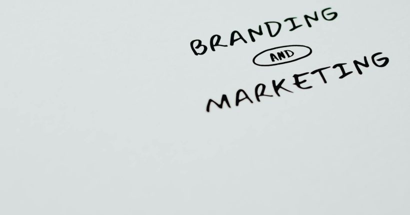 A minimalist image featuring the words 'Branding' and 'Marketing' on a white background, ideal for digital marketing themes.