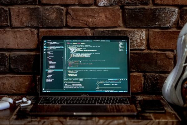 gray laptop computer turned-on