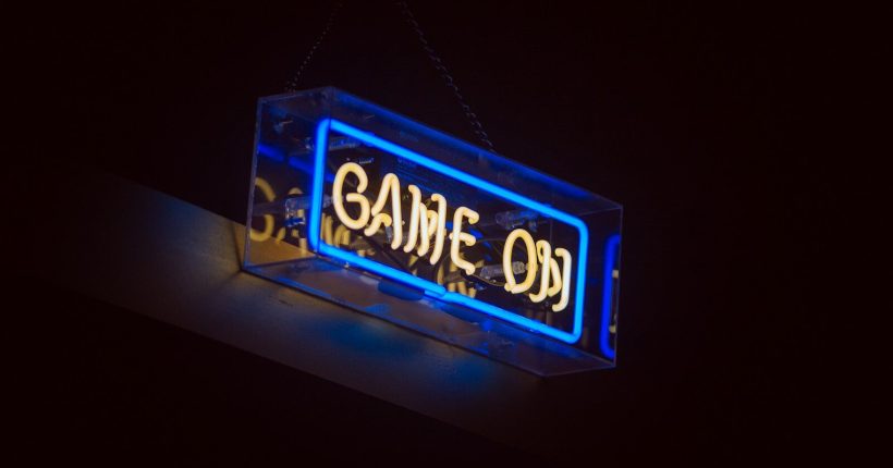 Game on neon signage turned on