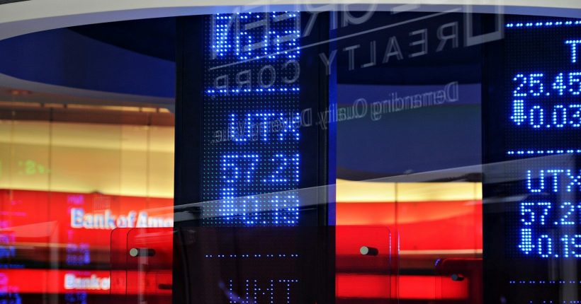 a bank sign in front of a building