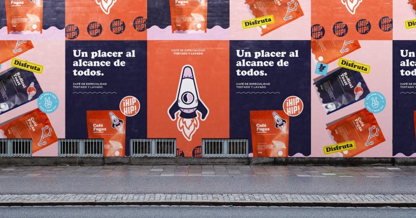 a row of posters on the side of a building