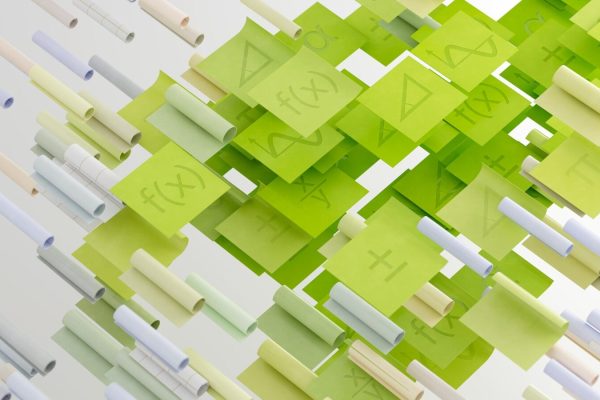 a group of green and white blocks with numbers on them