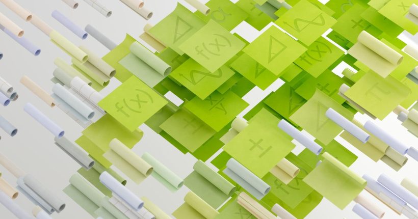 a group of green and white blocks with numbers on them